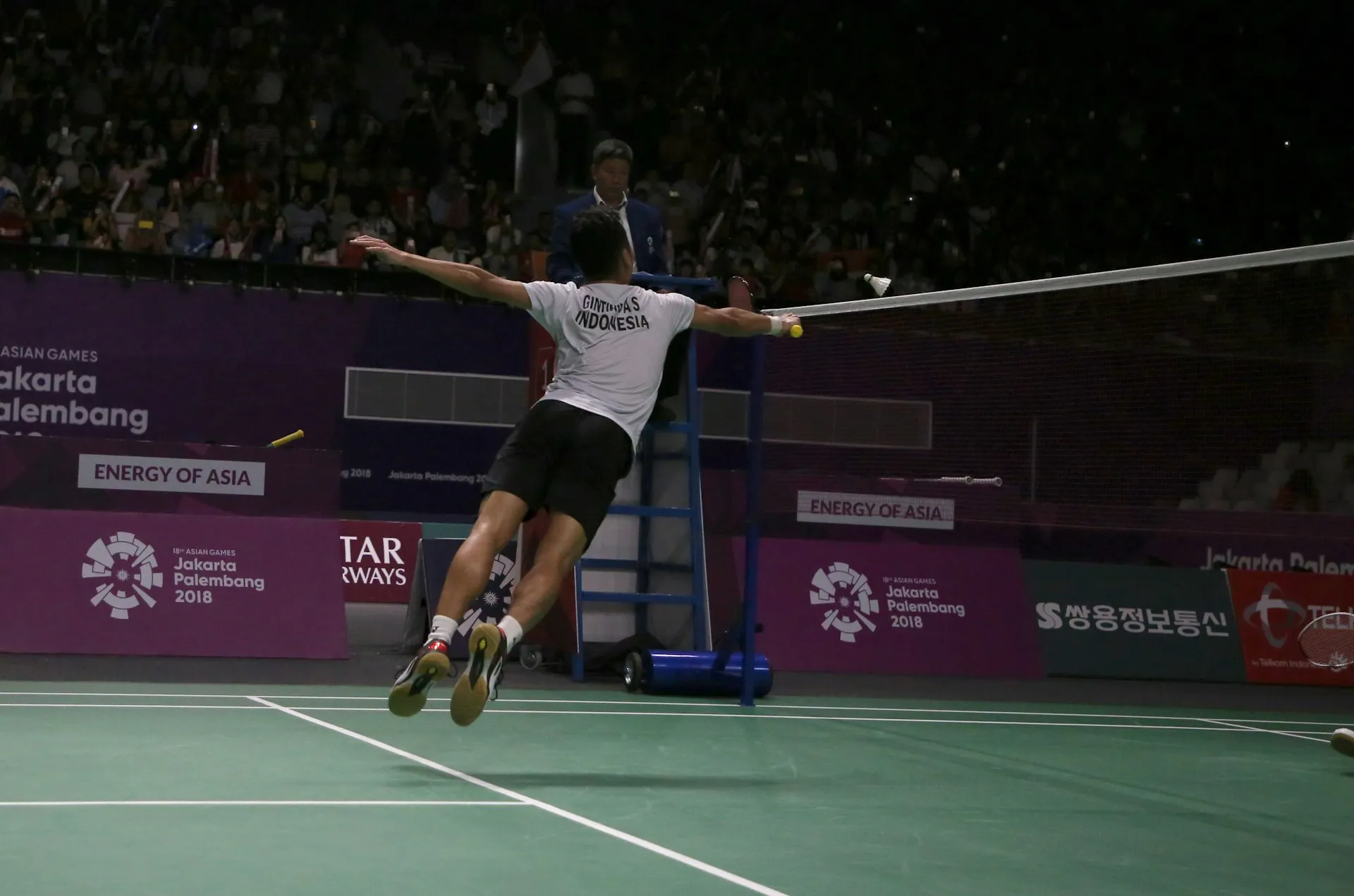 Badminton players in action